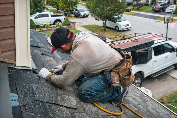 Professional Metal Roofing technician working in Frankfort, MI